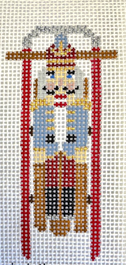 Anne Fisher Sled with Blue Nutcracker Ornament