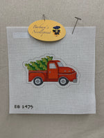 Red Pickup with Tree Ornmanet